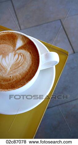 Stock Photo - Close-up of cappuccino in a cafe.. Fotosearch