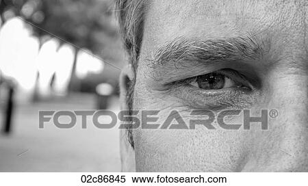 Close-up of intense face. View Large Photo Image Stock Photography - Close-up of intense face.. Fotosearch