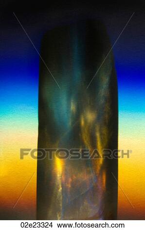 Close-up of light refracting through prism. View Large Photo Image Picture - Close-up of light refracting through prism.. Fotosearch