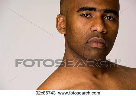 Close-up portrait of strong African-American man. View Large Photo Image Stock Image - Close-up portrait of strong African-American man.. Fotosearch