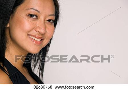 Close-up portrait of young Asian woman. View Large Photo Image Stock Photo - Close-up portrait of young Asian woman.. Fotosearch