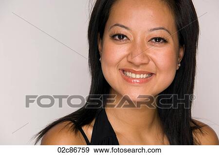 Close-up portrait of young Asian woman. View Large Photo Image Stock Photo - Close-up portrait of young Asian woman.. Fotosearch