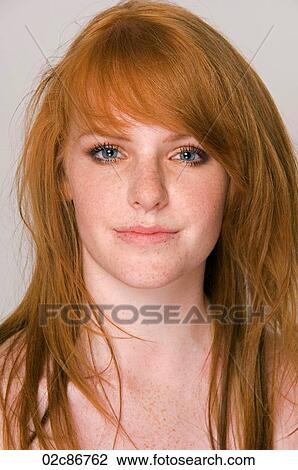 Close-up portrait of young red head woman. View Large Photo Image Stock Image - Close-up portrait of young red head woman.. Fotosearch