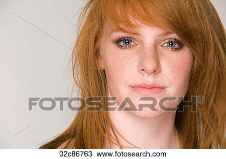 Close-up portrait of young red head woman. View Large Photo Image Stock Image - Close-up portrait of young red head woman.. Fotosearch