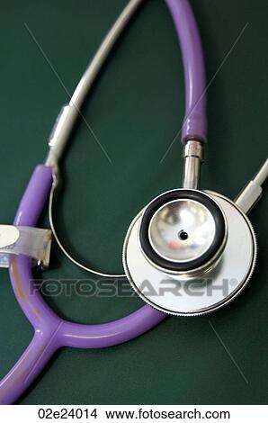 Close-up view of purple stethoscope. View Large Photo Image Picture - Close-up view of purple stethoscope.. Fotosearch