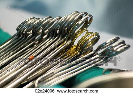 Close-up vignette of sterile surgical clamps. View Large Photo Image Stock Photograph - Close-up vignette of sterile surgical clamps.. Fotosearch