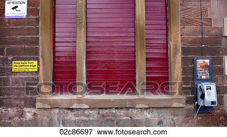 Closed kiosk with shutters down. View Large Photo Image Stock Photo - Closed kiosk with shutters down.. Fotosearch
