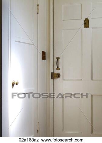 Closed white front door View Large Photo Image Stock Photo - Closed white front door. Fotosearch