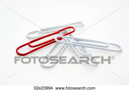 Cluster of paper clips with red one standing out. View Large Photo Image Picture - Cluster of paper clips with red one standing out.. Fotosearch