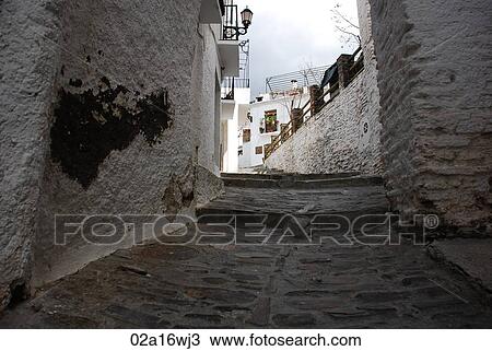 Cobbled alley in Alpujarras, Granada, Andalusia, Spain View Large Photo Image Stock Image - Cobbled alley in Alpujarras, Granada, Andalusia, Spain. Fotosearch