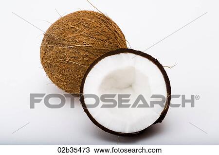 Stock Image - Coconut halves. Fotosearch