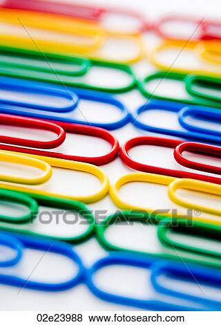 Collection of colourful paper clips lined up. View Large Photo Image Stock Photo - Collection of colourful paper clips lined up.. Fotosearch