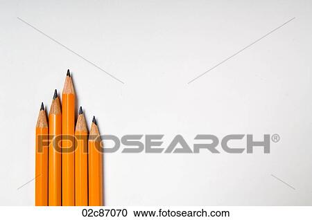Collection of yellow pencils on a white background. View Large Photo Image Stock Image - Collection of yellow pencils on a white background.. Fotosearch