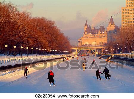 Picture - Commuters skating to work on the Rideau Canal, Ottawa Canada.. Fotosearch