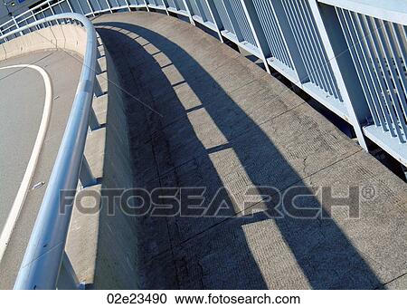 Curved walkway on bridge. View Large Photo Image Stock Image - Curved walkway on bridge.. Fotosearch