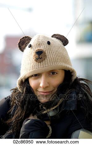 Cute young woman with winter bear hat. View Large Photo Image Stock Image - Cute young woman with winter bear hat.. Fotosearch