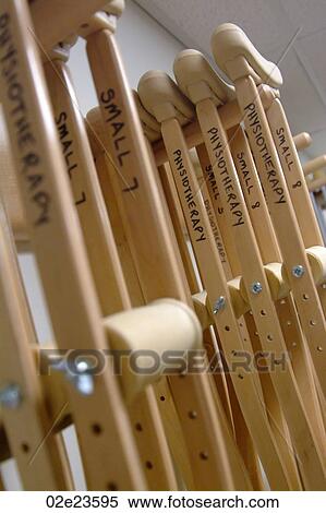 Stock Photography - Detail of hanging crutches in physiotherapy room of hospital.. Fotosearch