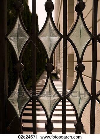 Diamond shape glass on a gate in Athens Greece View Large Photo Image Stock Image - Diamond shape glass on a gate in Athens Greece. Fotosearch