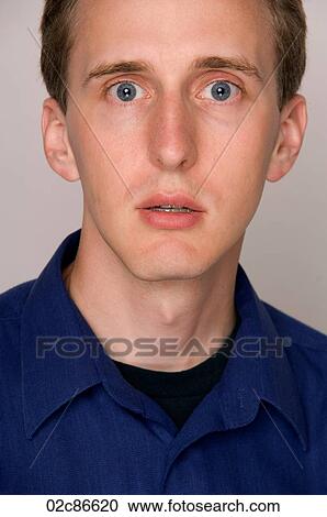 Dismayed man's face. View Large Photo Image Stock Image - Dismayed man's face.. Fotosearch