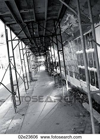 Stock Photograph - Downtown urban scaffolding system.. Fotosearch