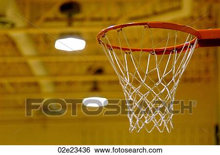 Empty basketball net in gymnasium View Large Photo Image Stock Photograph - Empty basketball net in gymnasium. Fotosearch