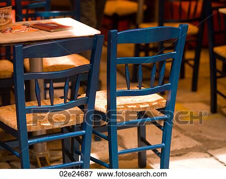 Empty restaurant chairs in Athens Greece View Large Photo Image Stock Photo - Empty restaurant chairs in Athens Greece. Fotosearch