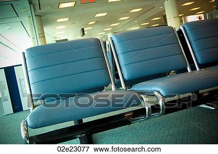 Empty seats in departures lounge at airport. View Large Photo Image Stock Photo - Empty seats in departures lounge at airport.. Fotosearch