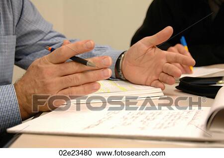 Executive leading a meeting in boardroom. View Large Photo Image Stock Image - Executive leading a meeting in boardroom.. Fotosearch