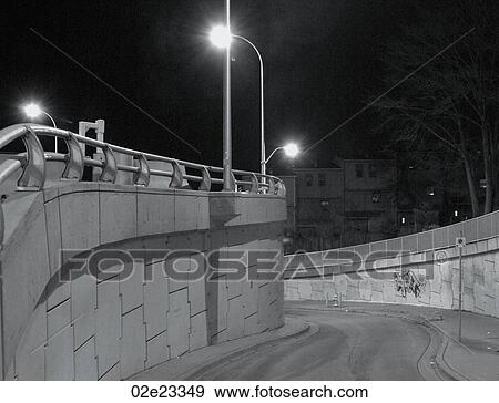 Stock Photo - Exit ramp at night.. Fotosearch