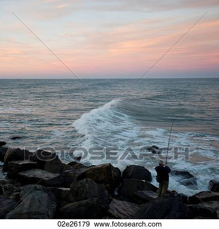 Fisherman on the Hamptons seashore View Large Photo Image Stock Photo - Fisherman on the Hamptons seashore. Fotosearch