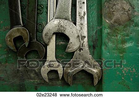 Five wrenches hanging in machine shop. View Large Photo Image Stock Photo - Five wrenches hanging in machine shop.. Fotosearch