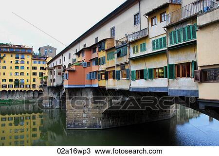 Stock Image - Florence, Italy. The Ponte Vecchio and River Arno. Fotosearch