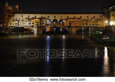 Stock Photograph - Florence, Italy. The Ponte Vecchio and River Arno. Fotosearch