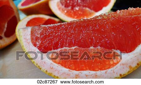 Freshly cut healthy grapefruit. View Large Photo Image Stock Photo - Freshly cut healthy grapefruit.. Fotosearch
