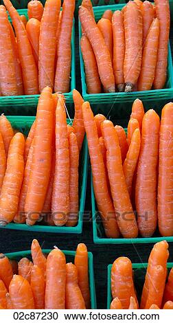 Freshly grown carrots on display at a farmer's market. View Large Photo Image Stock Image - Freshly grown carrots on display at a farmer's market.. Fotosearch