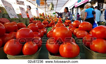 Freshly grown tomatoes on display at a farmer's market. View Large Photo Image Stock Photograph - Freshly grown tomatoes on display at a farmer's market.. Fotosearch