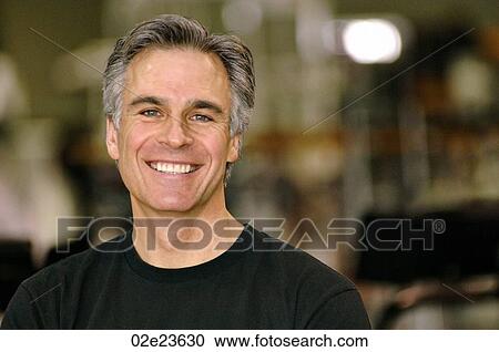 Friendly middle aged man's face. View Large Photo Image Stock Image - Friendly middle aged man's face.. Fotosearch