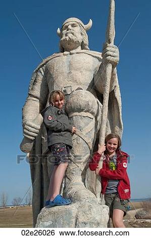 Girls standing on the Viking statue in Gimli, Manitoba Canada View Large Photo Image Stock Photograph - Girls standing on the Viking statue in Gimli, Manitoba Canada. Fotosearch