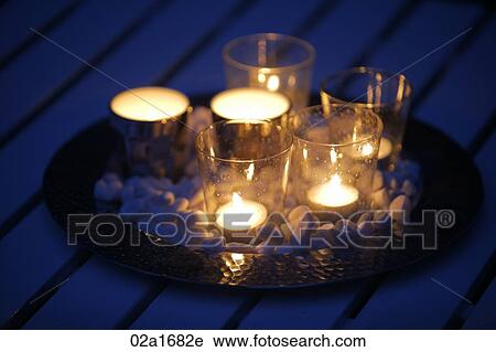 Stock Image - Glowing candles. Fotosearch