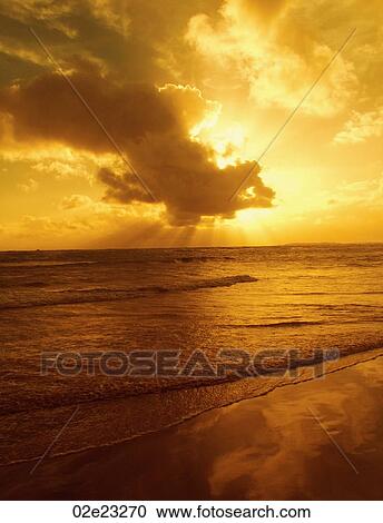 Golden morning sunburst over ocean. View Large Photo Image Stock Image - Golden morning sunburst over ocean.. Fotosearch