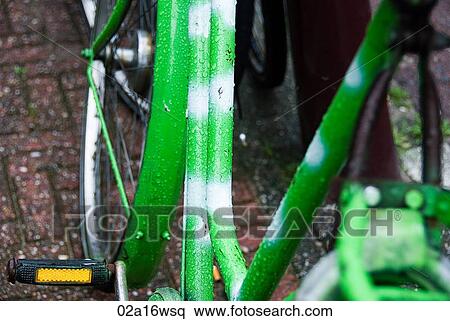 Green bicycle frame in rain, Amsterdam, Holland View Large Photo Image Stock Photography - Green bicycle frame in rain, Amsterdam, Holland. Fotosearch