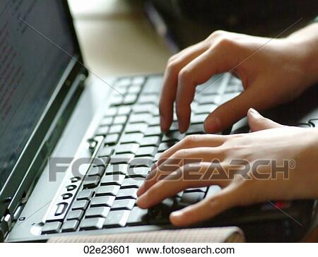 Hands typing on laptop keyboard. View Large Photo Image Stock Image - Hands typing on laptop keyboard.. Fotosearch