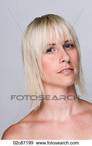 Stock Photo - Healthy beautiful blonde woman face shot on white background. Fotosearch