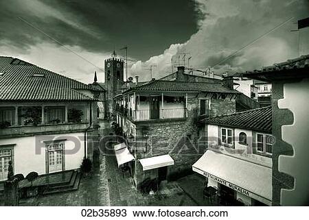 Stock Image - High top view of Medieval Town, Tinted B&W. Fotosearch