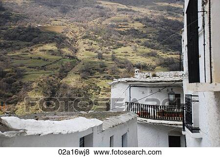 House balcony and hillside in Alpujarras, Granada, Andalusia, Spain View Large Photo Image Stock Photo - House balcony and hillside in Alpujarras, Granada, Andalusia, Spain. Fotosearch