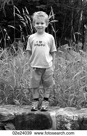 I love Daddy, little boy on rock. View Large Photo Image Stock Photo - I love Daddy, little boy on rock.. Fotosearch