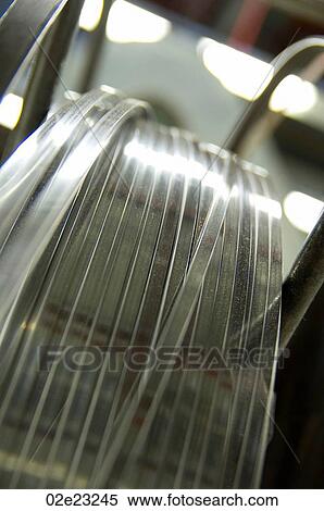 Industrial metal strapping on spool. View Large Photo Image Stock Photography - Industrial metal strapping on spool.. Fotosearch