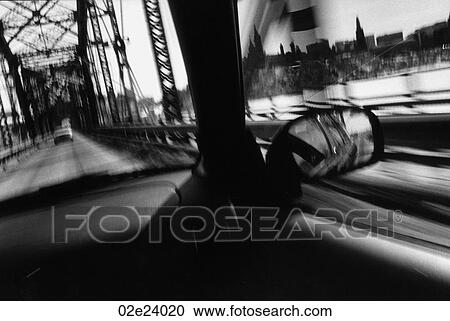 Interior of a car while it is traveling across bridge. View Large Photo Image Stock Image - Interior of a car while it is traveling across bridge.. Fotosearch