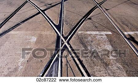 Intersecting crossing street-car tracks. View Large Photo Image Stock Image - Intersecting crossing street-car tracks.. Fotosearch