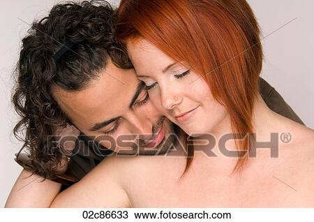 Stock Image - Intimate couple embracing.. Fotosearch